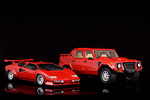 Two Lamborghini models from the same era, the Countach and the LM002